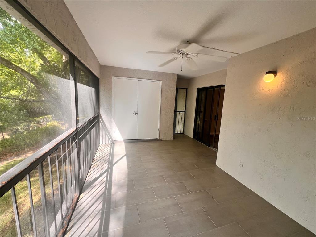 17 Escondido Circle, Unit 239 Altamonte Springs, FL 32701 - Photo 13 of 30 a view of a hallway with a window