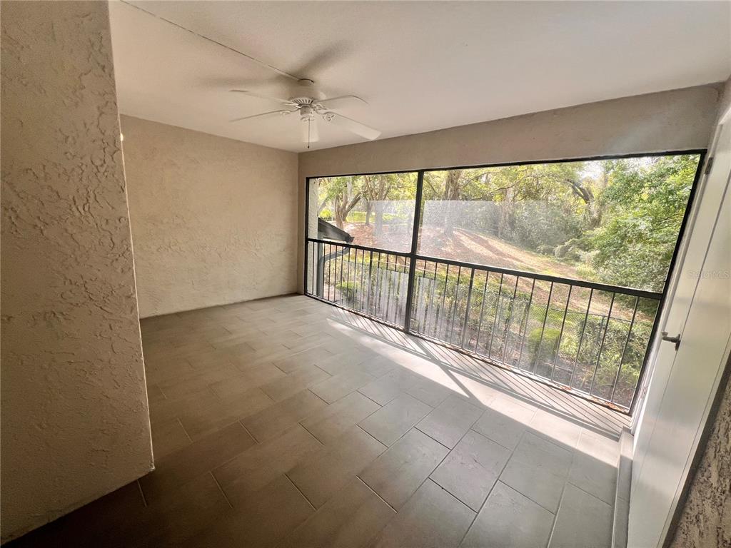 17 Escondido Circle, Unit 239 Altamonte Springs, FL 32701 - Photo 14 of 30 an empty room with windows and city view