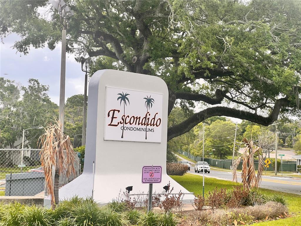 17 Escondido Circle, Unit 239 Altamonte Springs, FL 32701 - Photo 2 of 30 a sign that is on the side of a road