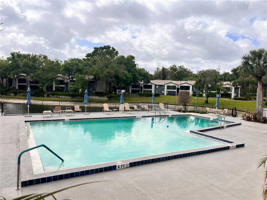 17 Escondido Circle, Unit 239 Altamonte Springs, FL 32701 - Photo 30 of 30 an aerial view of a swimming pool with outdoor seating
