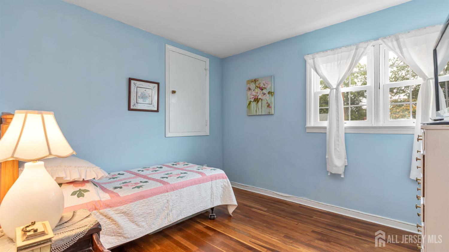 77-89 Parkside Road Plainfield, NJ 07060 - Photo 14 of 42 a bedroom with a bed and a window