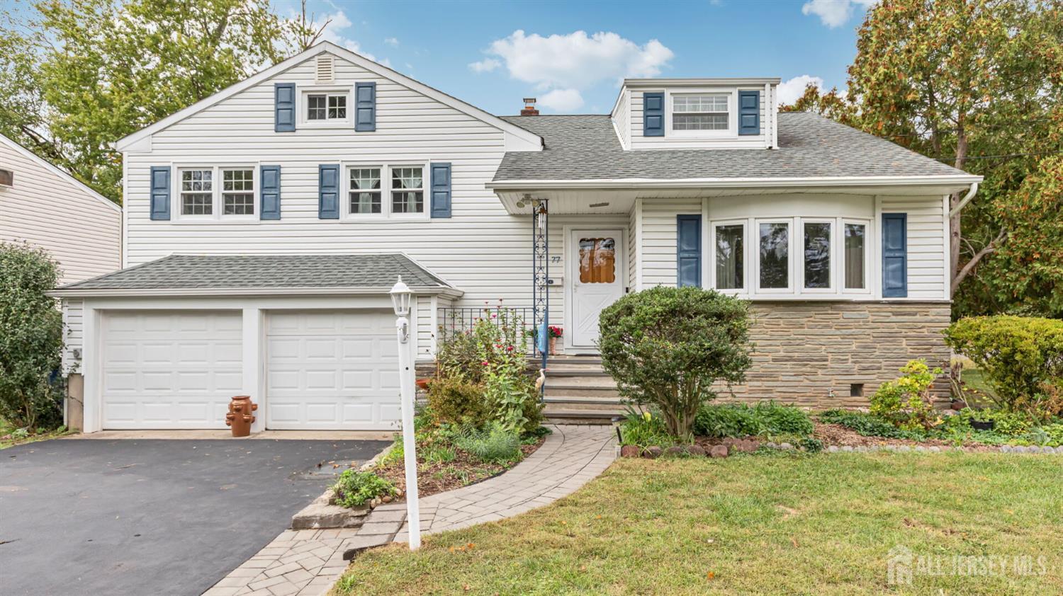 77-89 Parkside Road Plainfield, NJ 07060 - Photo 32 of 42 a front view of a house with garden