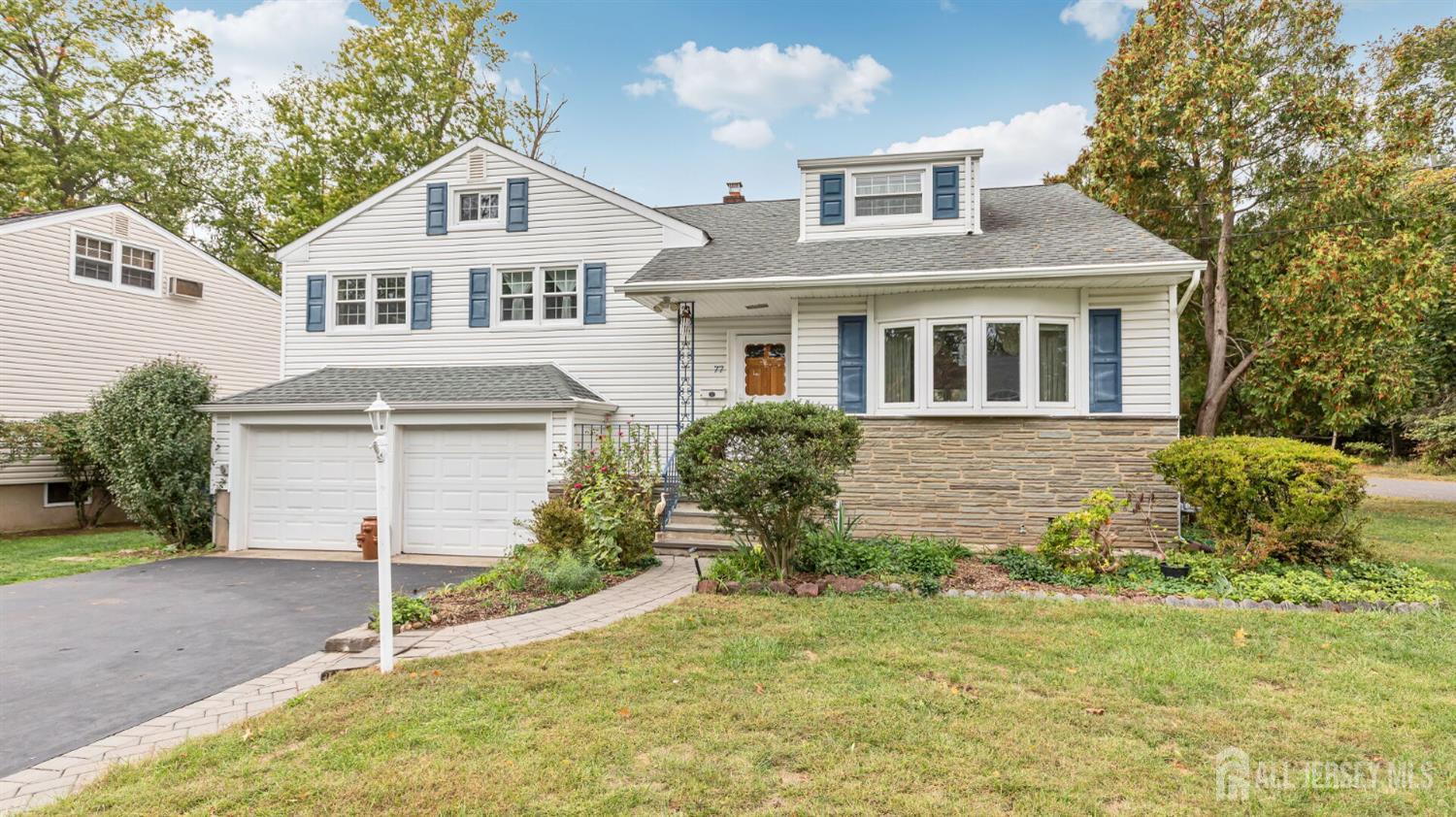 77-89 Parkside Road Plainfield, NJ 07060 - Photo 33 of 42 a front view of a house with a yard
