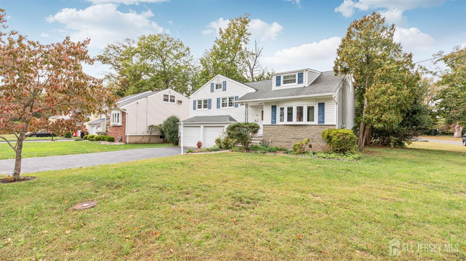 77-89 Parkside Road Plainfield, NJ 07060 - Photo 36 of 42 a front view of a house with garden