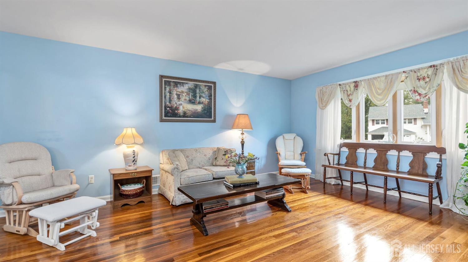 77-89 Parkside Road Plainfield, NJ 07060 - Photo 4 of 42 a living room with furniture a rug and a window
