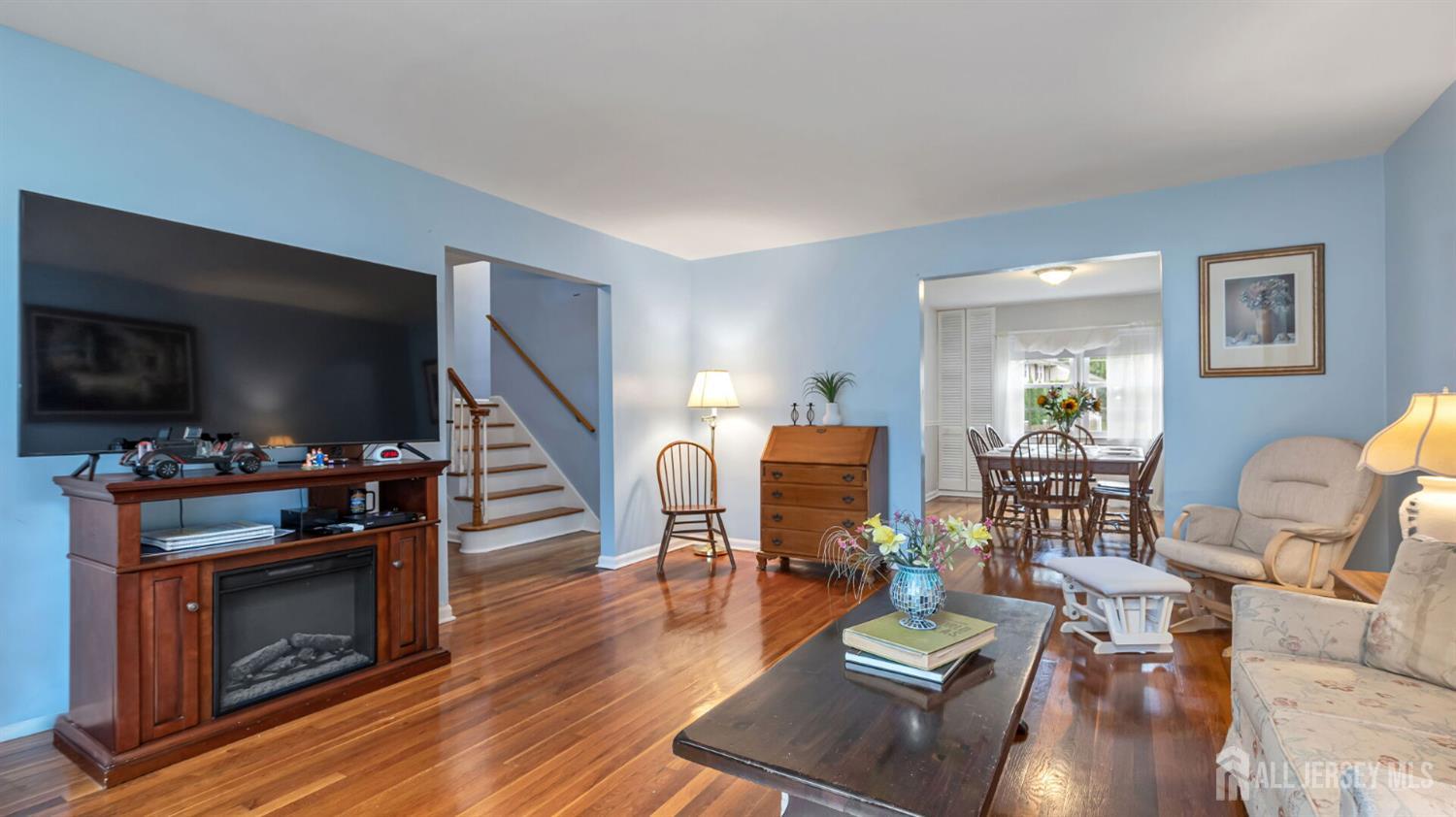 77-89 Parkside Road Plainfield, NJ 07060 - Photo 6 of 42 a living room with furniture and a flat screen tv