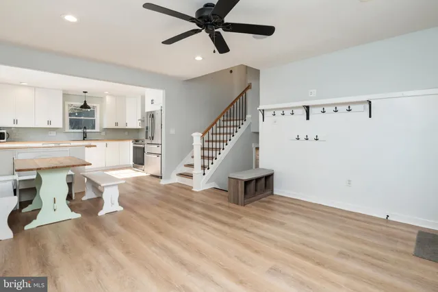 a view of kitchen with furniture and entryway