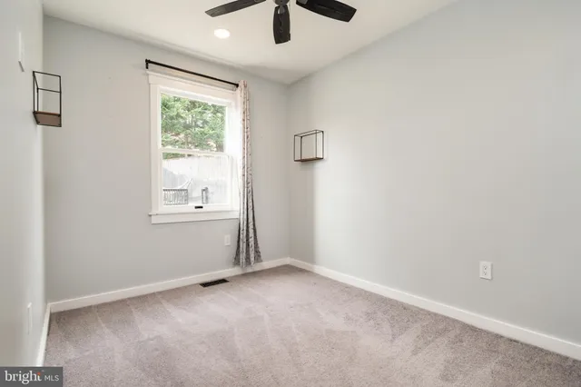 a view of a wooden deck with a patio