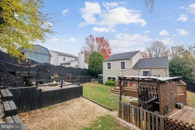 a backyard of a house with seating space