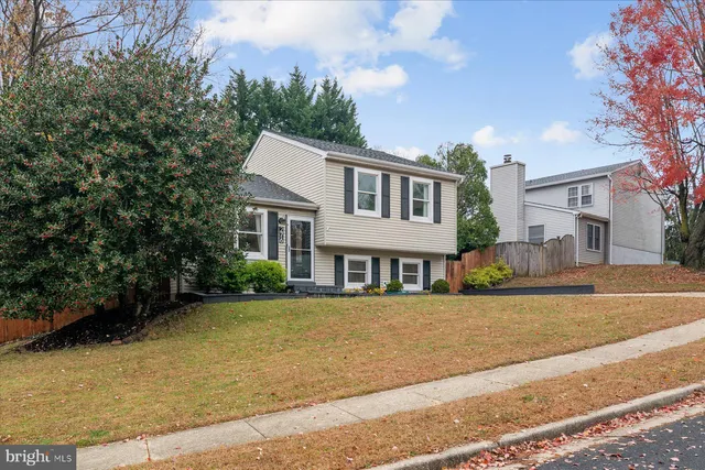 an aerial view of a house with outdoor space