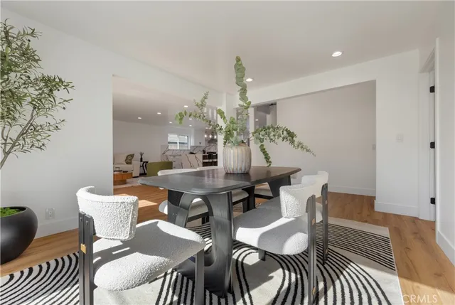 a bedroom with a large bed and a couch