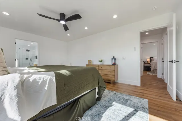 a large bathroom with a large tub sink and vanity