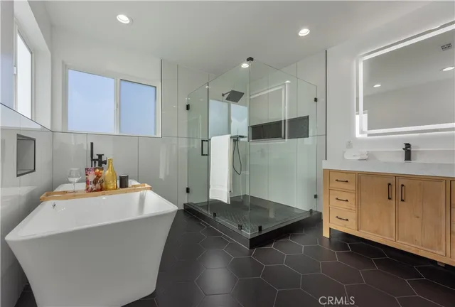 a bed room with a bed and a tv