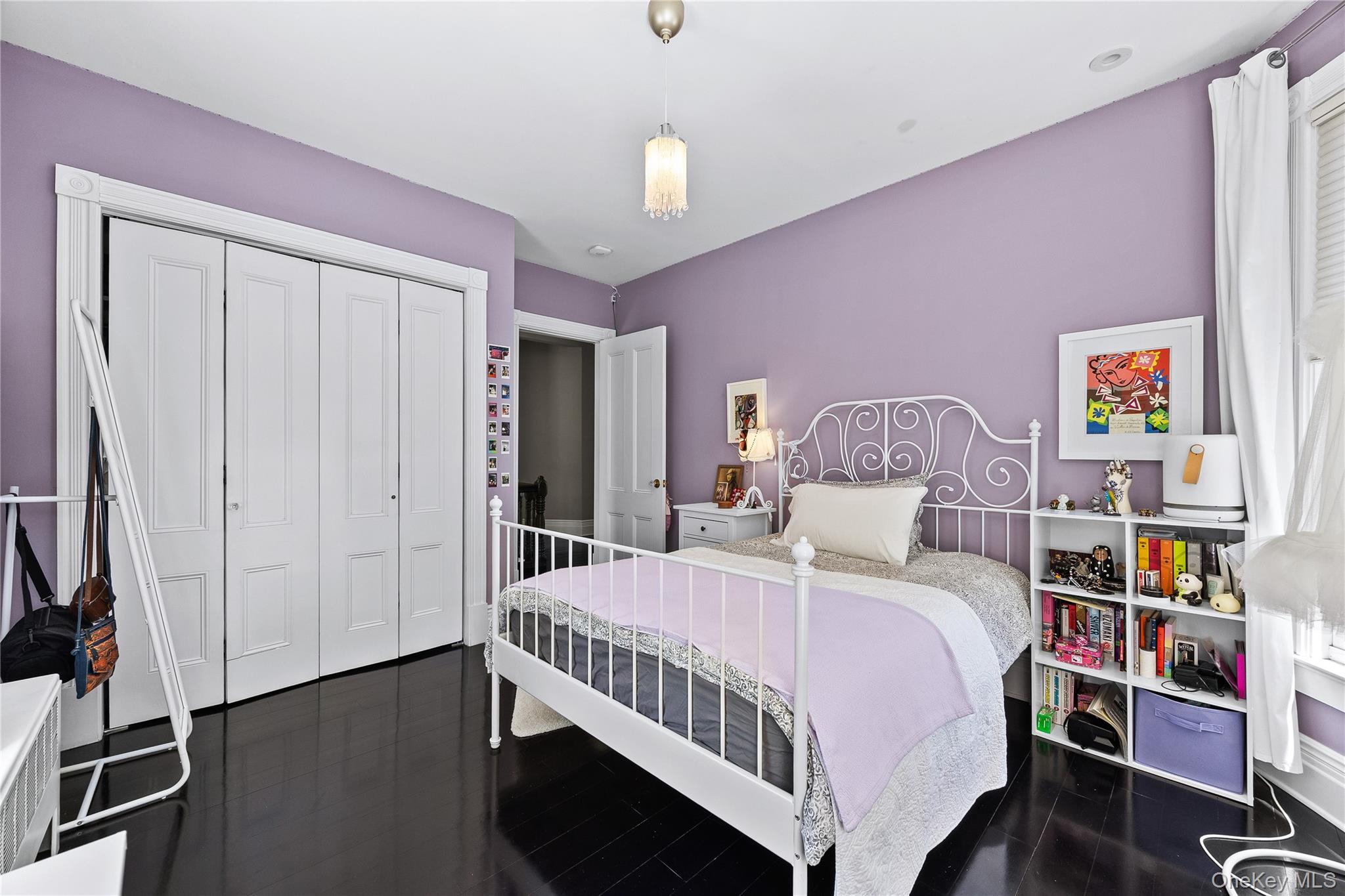 19 Howe Place Bronxville, NY 10708 - Photo 17 of 37 Dark-finish wood flooring complements light lavender walls