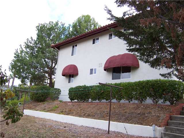 4005 South Mission Road Fallbrook, CA 92028 - Photo 16 of 23 North side of home - Yes, that is a clothesline, but you could convert it into a shuffle board or ring toss court