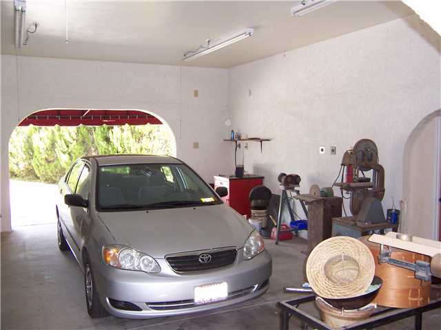 4005 South Mission Road Fallbrook, CA 92028 - Photo 20 of 23 Open carport with 220 outlets and an attached workshop