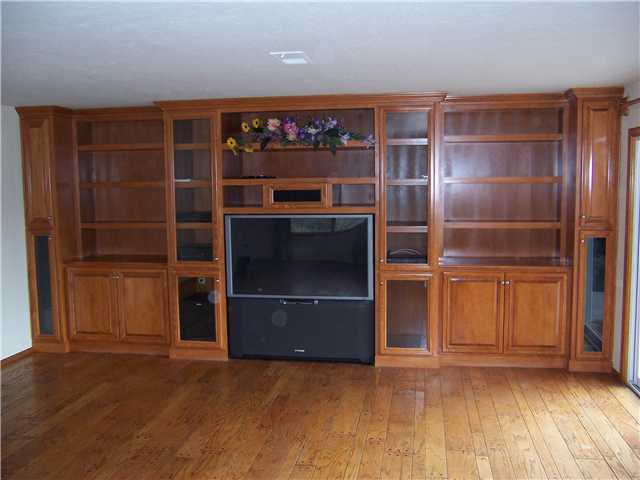 4005 South Mission Road Fallbrook, CA 92028 - Photo 9 of 23 Built-in entertainment center with big screen TV, carousel DVD, VHS and Surround Sound System make for a fun get together with family and friends