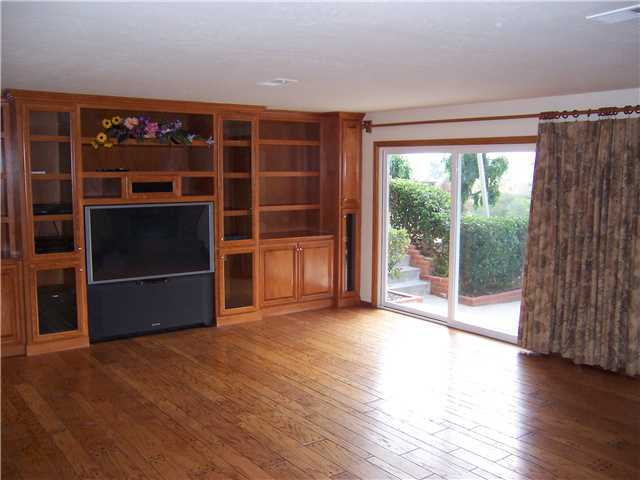4005 South Mission Road Fallbrook, CA 92028 - Photo 10 of 23 Another view of Family Room showing sliding door to side patio. Dancing anyone?