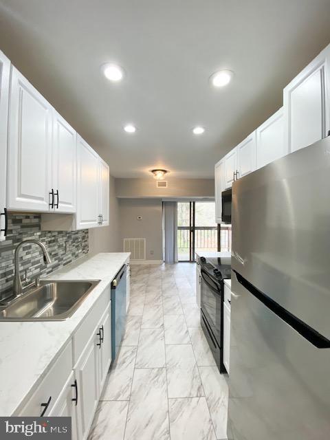 11605 Stoneview Square, Unit 65/22C Reston, VA 20191 - Photo 1 of 9 KITCHEN