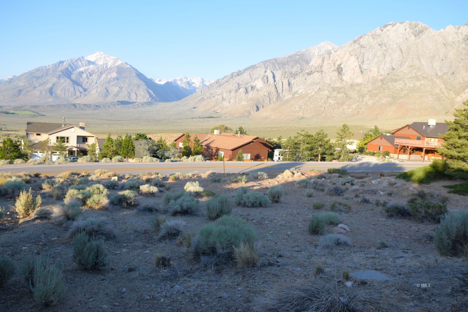 Paradise Point Bishop, CA 93514 - Photo 6 of 8 a view of a dry yard with mountains in the background