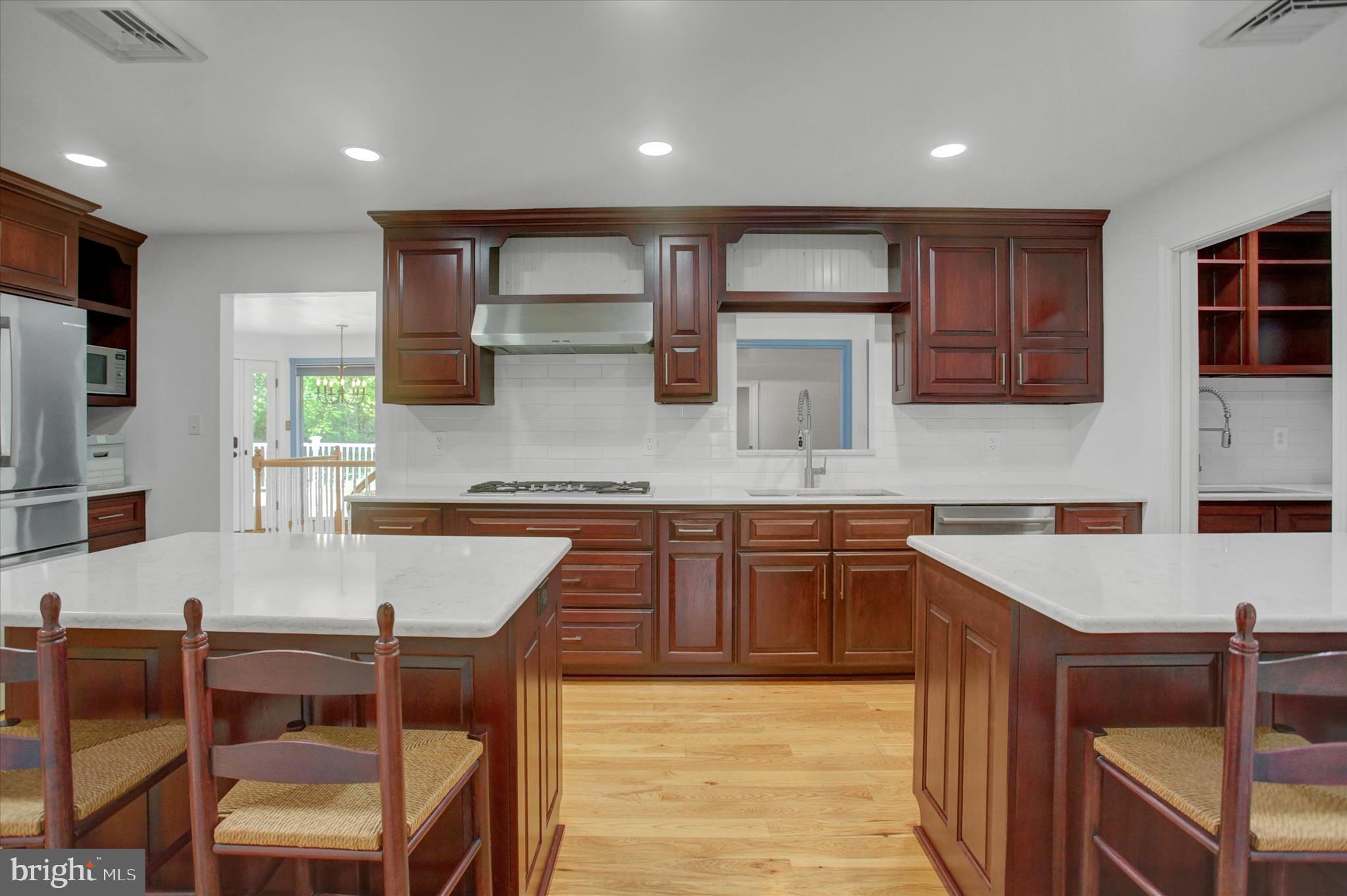 98 Peach Glen Road Gardners, PA 17324 - Photo 8 of 85 a kitchen with stainless steel appliances granite countertop wooden cabinets a stove top oven a sink and dishwasher