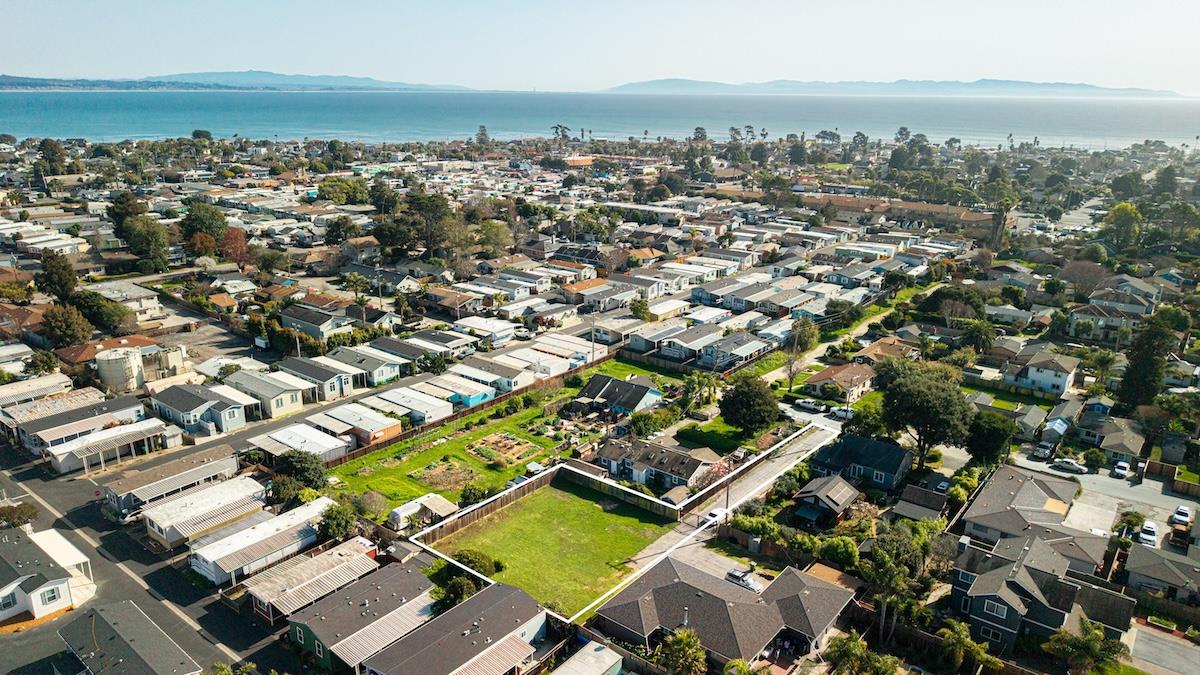 an aerial view of residential building with parking space