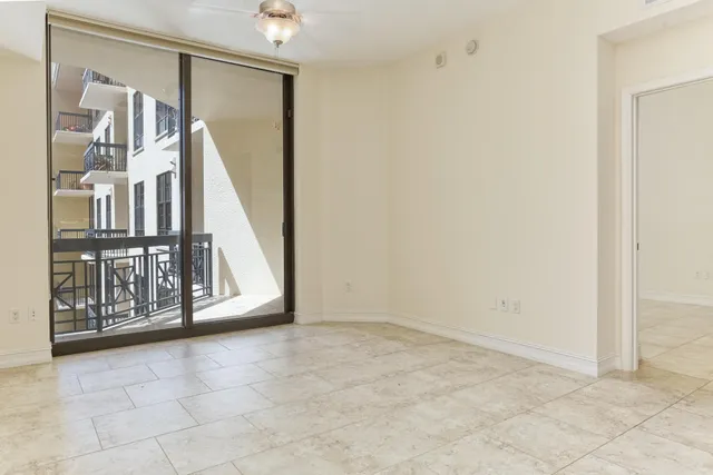 a view of a hallway with washer and dryer