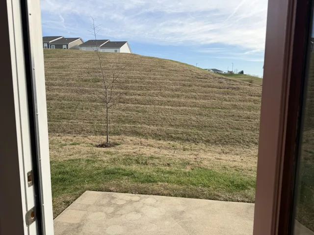 a view of storage and utility room with racks on the wall