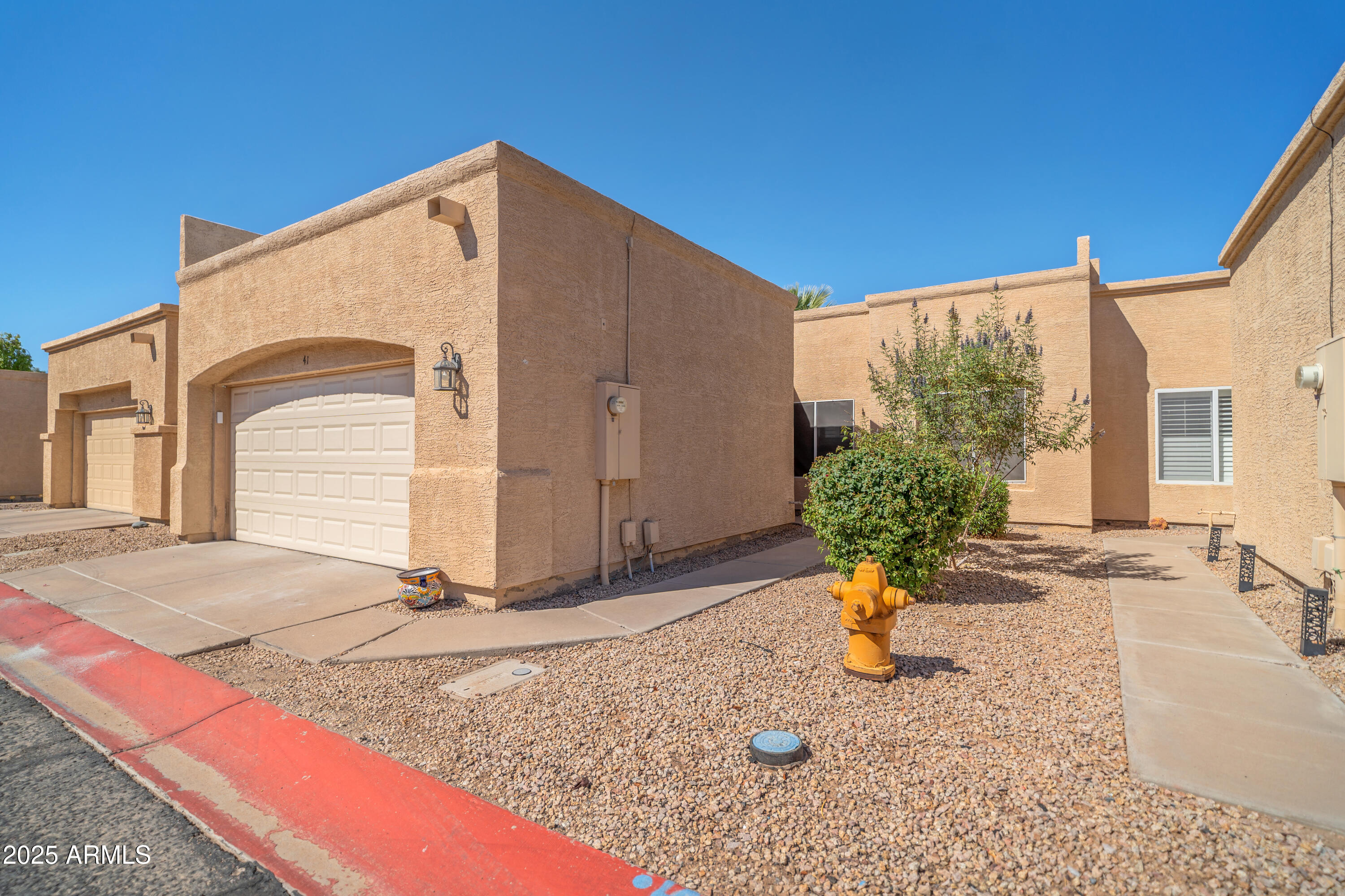 625 North Hamilton Street, Unit 41 Chandler, AZ 85225 - Photo 23 of 25 a view of a house with a patio