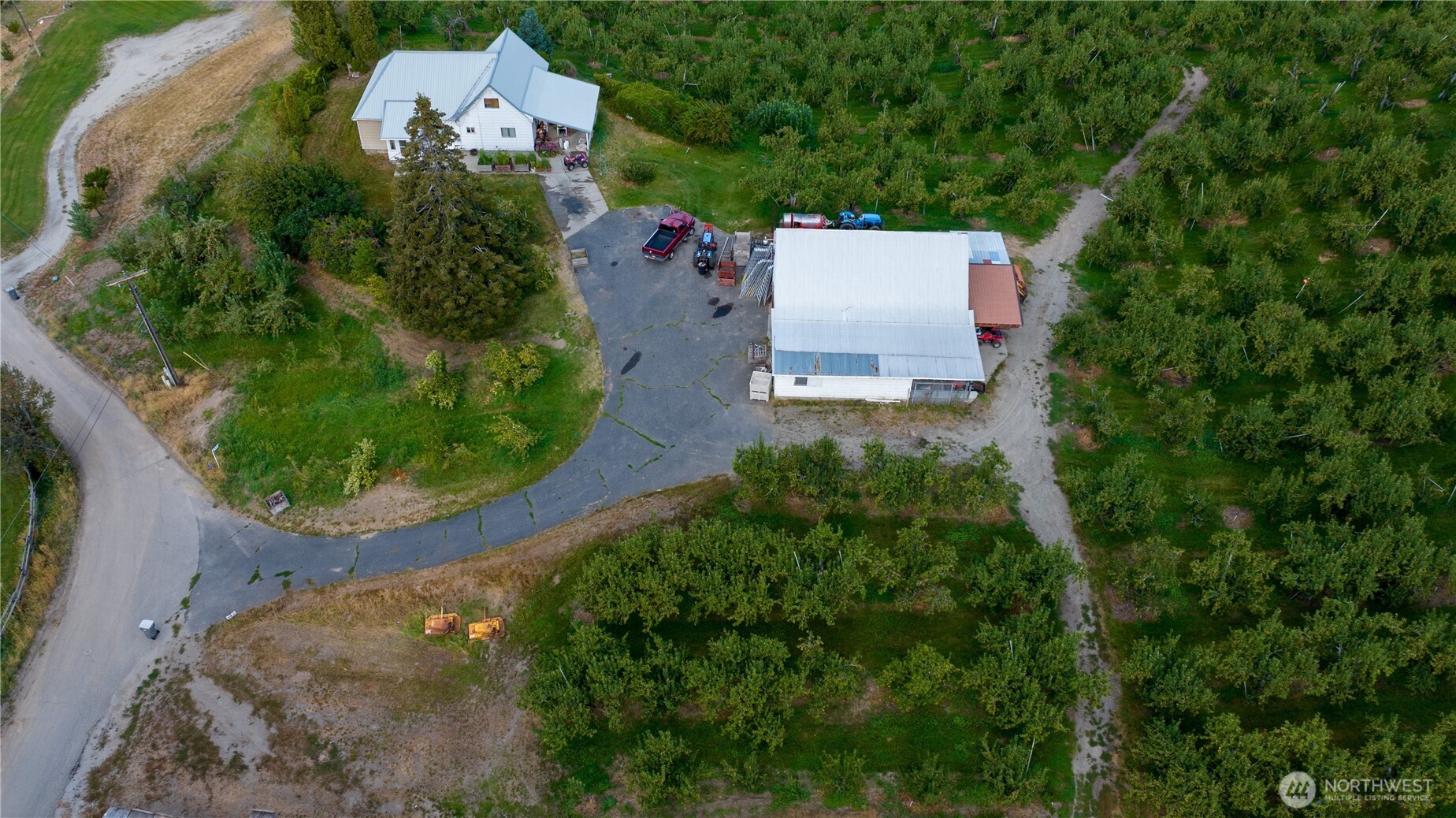 8612 Ludwig Hill Road Peshastin, WA 98847 - Photo 28 of 30 an aerial view of a house with a garden and yard