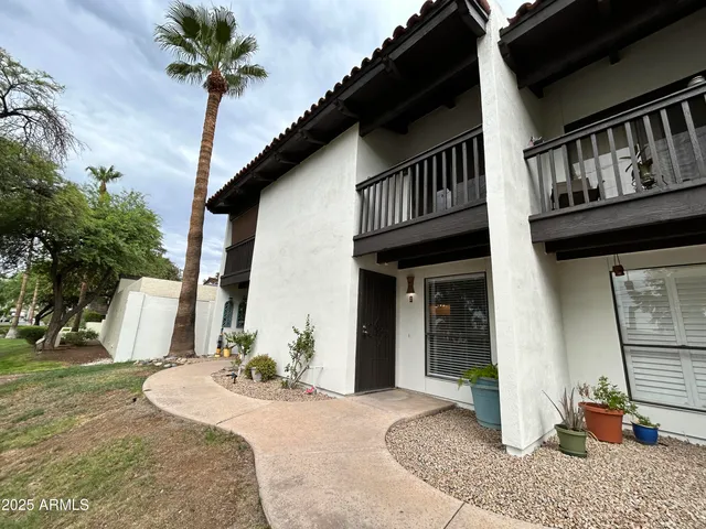 a house view with a outdoor space