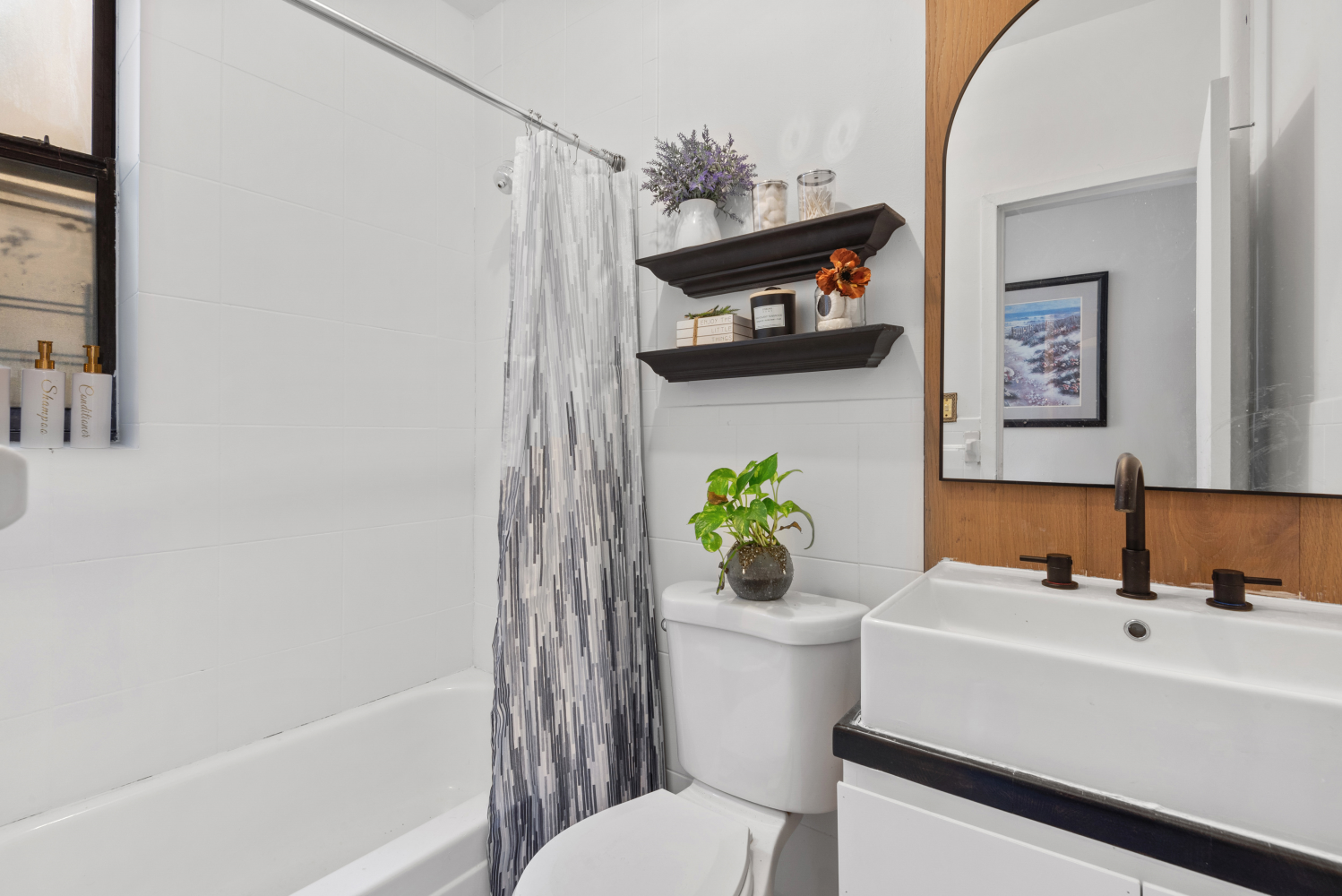 1809 Adam Clayton Powell Jr Boulevard, Unit 5E Manhattan, NY 10026 - Photo 7 of 9 a white bath tub sitting next to a white toilet