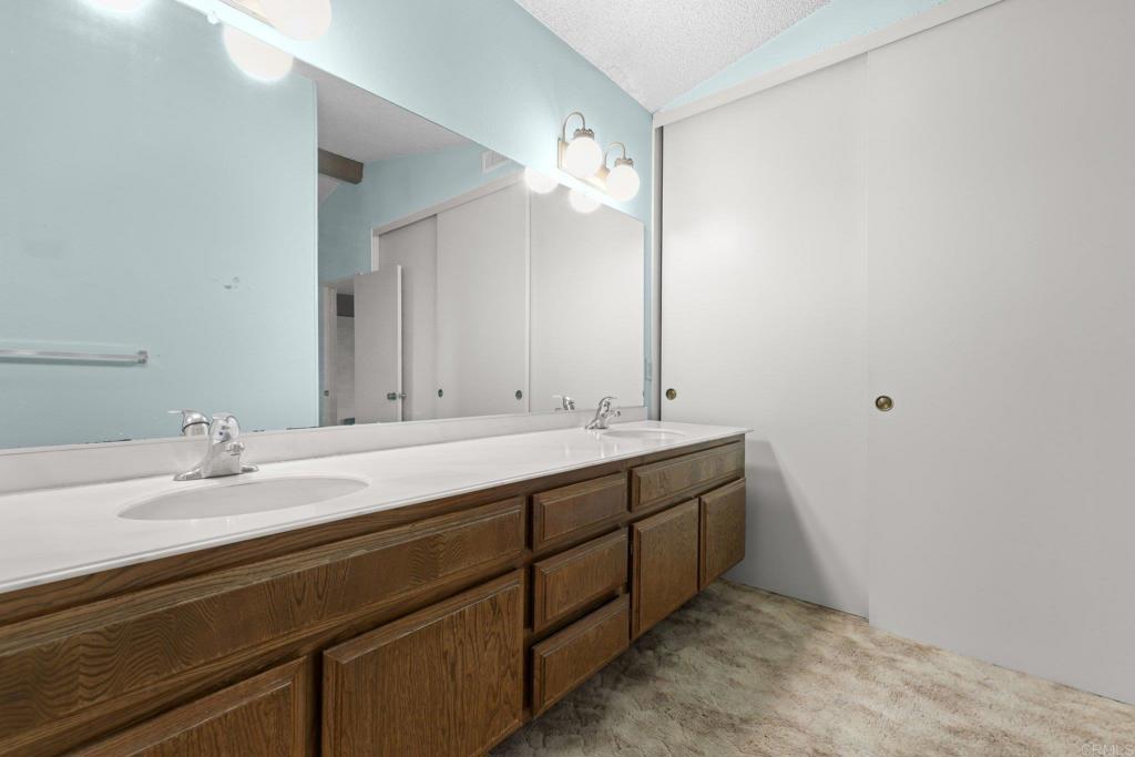 10527 Moorpark Street Spring Valley, CA 91978 - Photo 26 of 42 main bed/bath double sink vanity