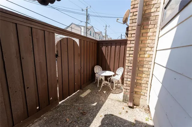 a view of balcony with furniture
