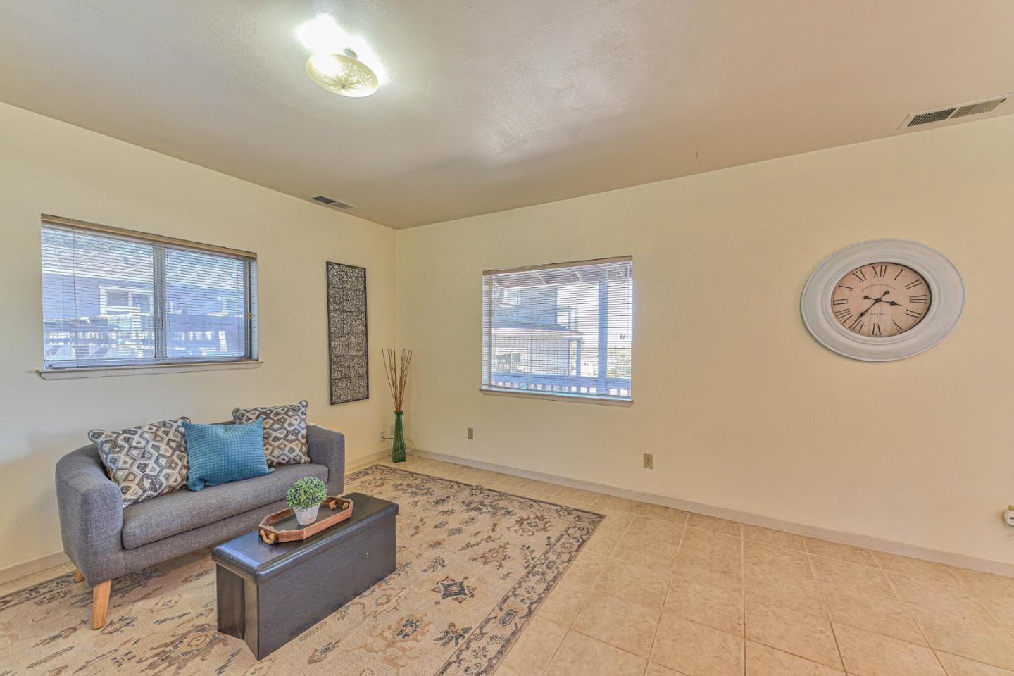 394 Mesa Road Salinas, CA 93908 - Photo 43 of 53 a living room with couch and a view of kitchen