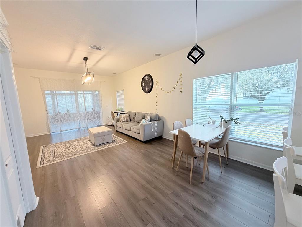 5634 Tanagerlake Road Lithia, FL 33547 - Photo 9 of 46 a living room with furniture and a window