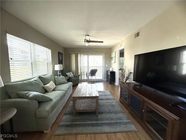 a bathroom with a sink toilet and a mirror