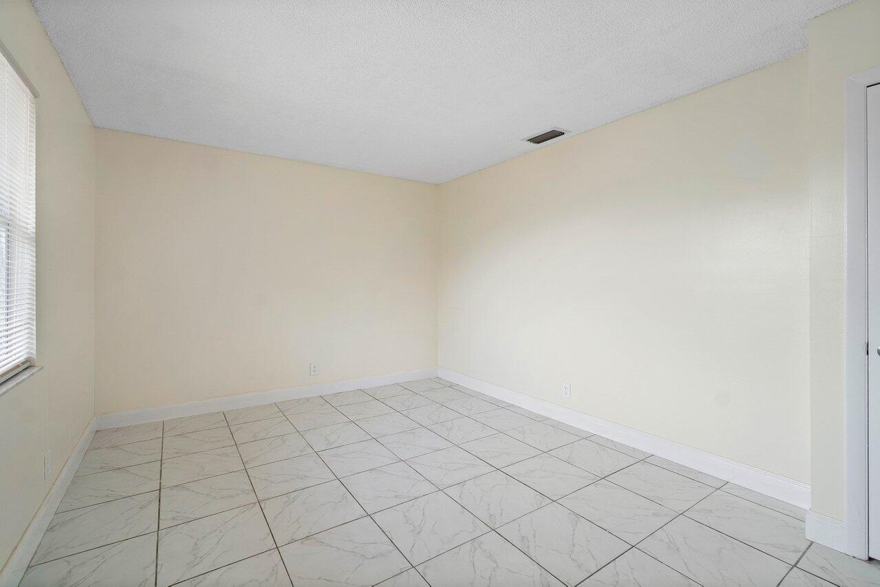 4094 Kirk Road Lake Worth, FL 33461 - Photo 11 of 22 011-4094KirkRoad-LakeWorth-FL-33461-SMAL