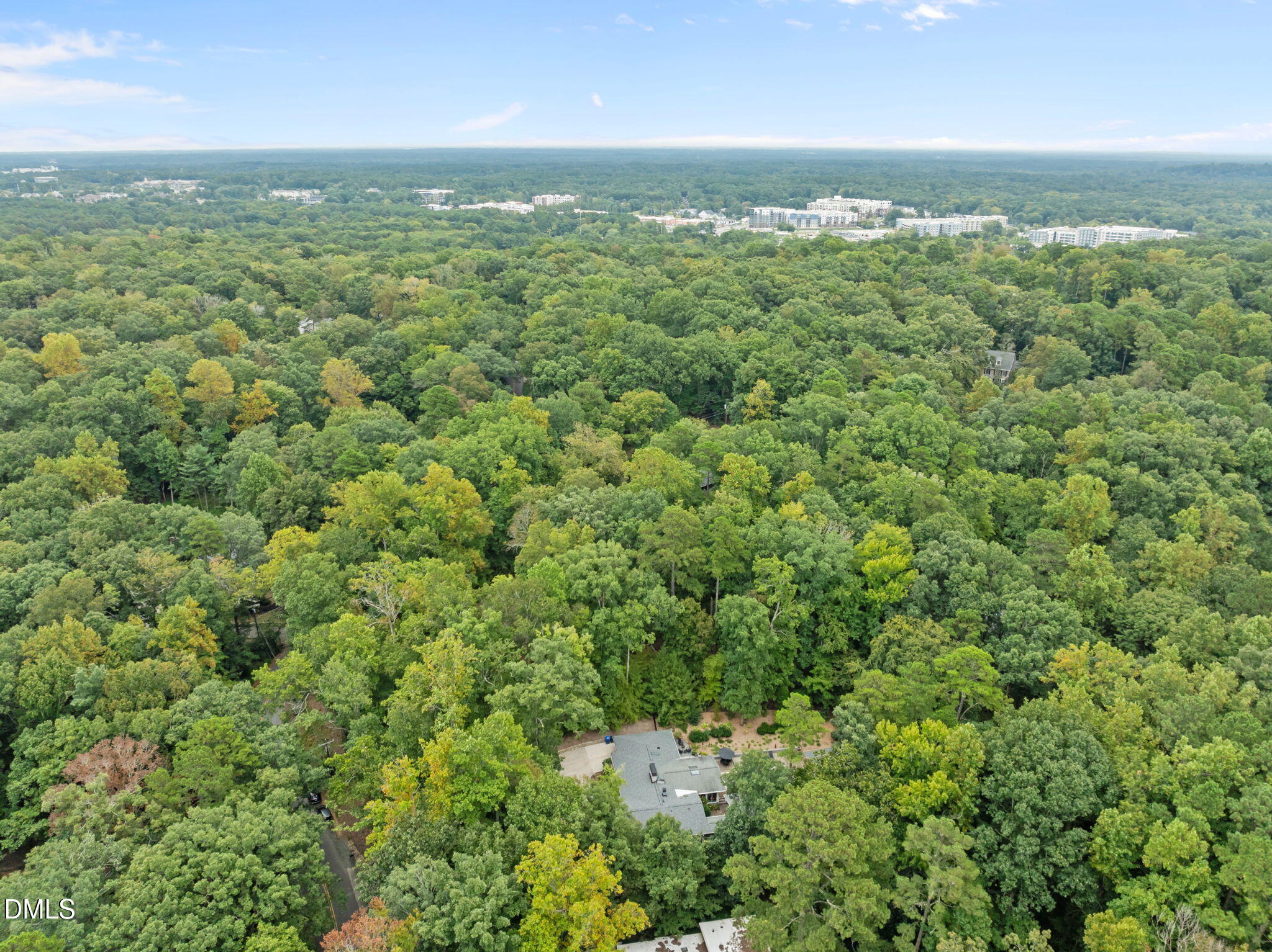 1812 Rolling Road Chapel Hill, NC 27514 - Photo 59 of 72 an aerial view of residential houses with outdoor space and trees