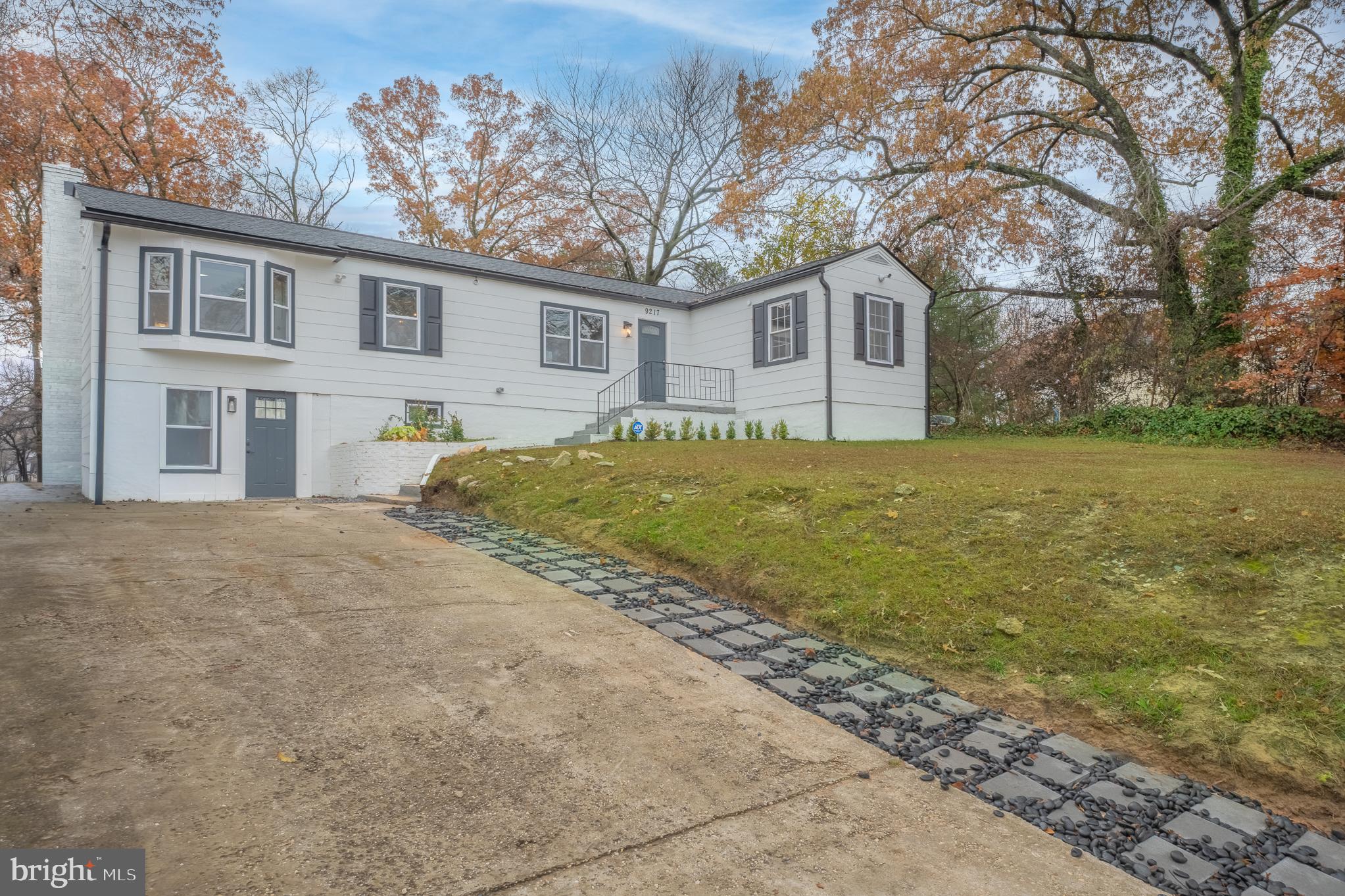 9217 Fowler Lane Lanham, MD 20706 - Photo 77 of 80 a view of a house with a backyard