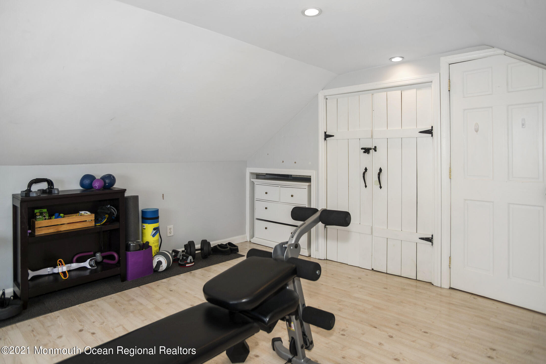 511 Cerrina Road Jackson, NJ 08527 - Photo 31 of 46 a room with furniture a flat screen tv and gym equipment