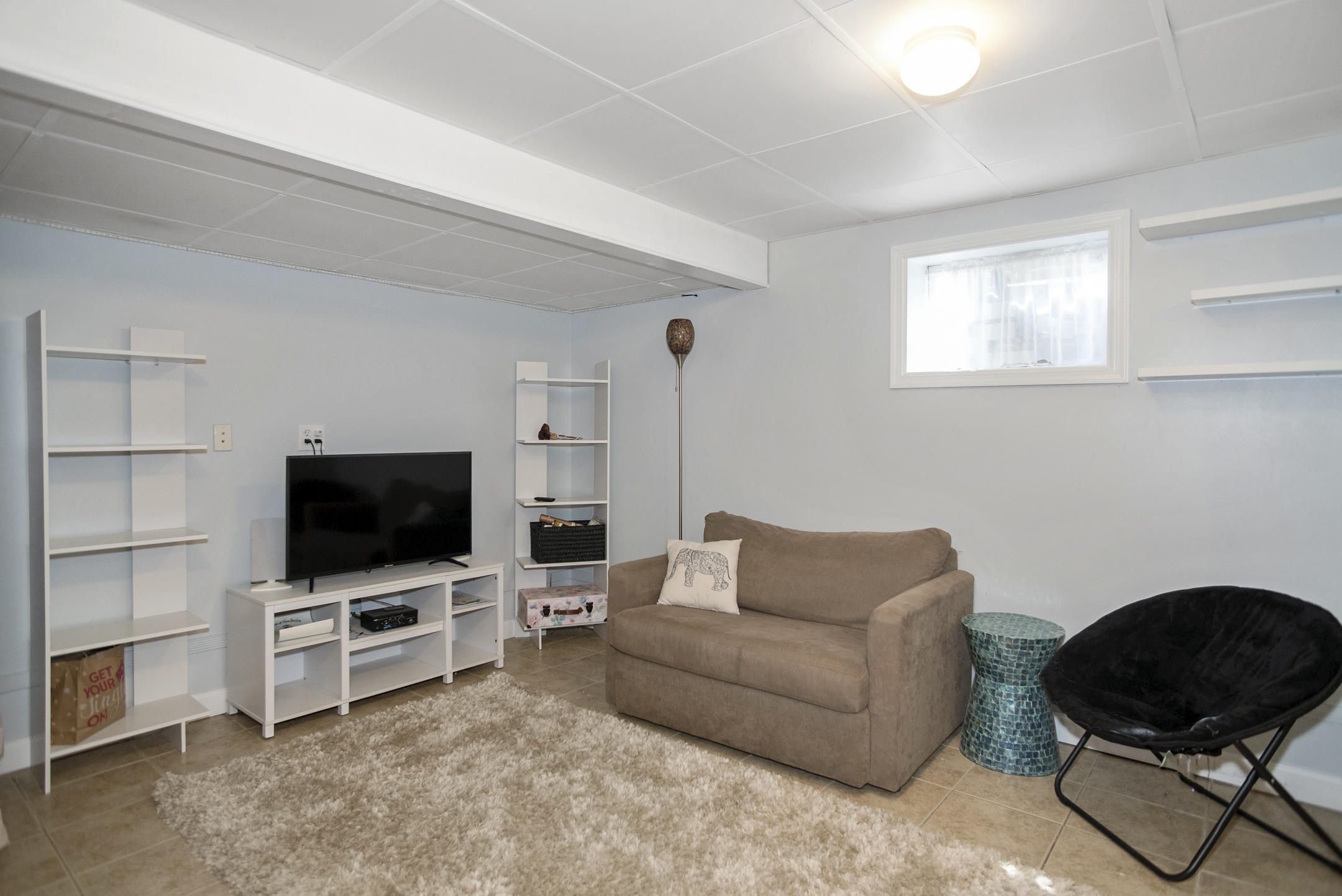 511 Cerrina Road Jackson, NJ 08527 - Photo 34 of 46 a living room with furniture and a flat screen tv