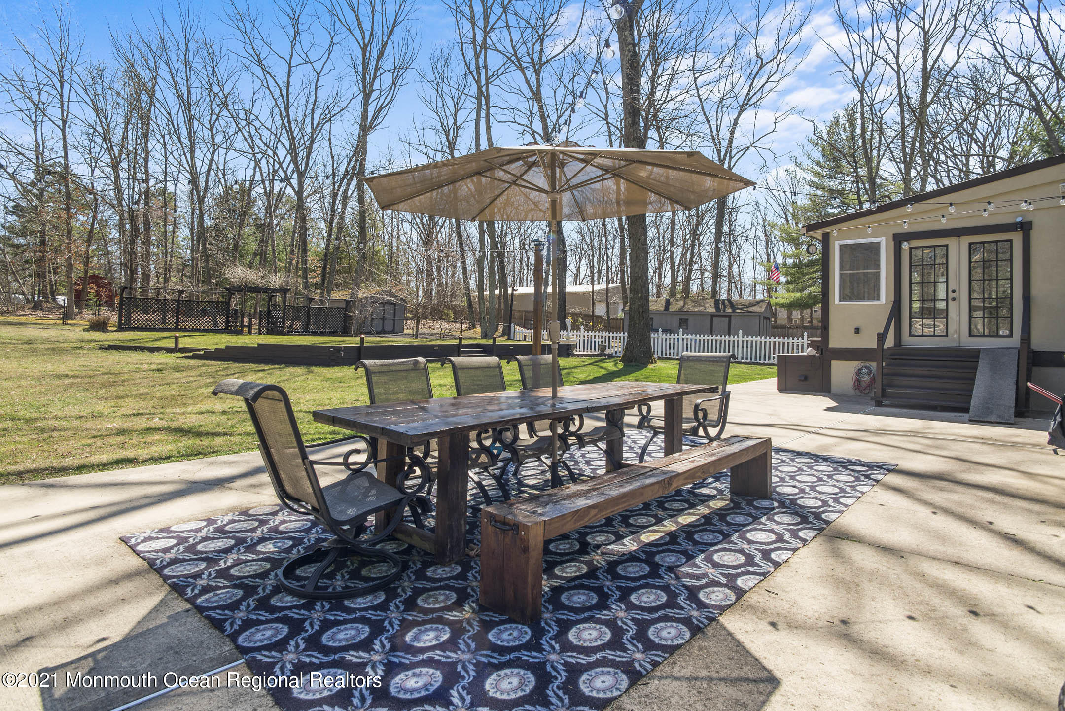 511 Cerrina Road Jackson, NJ 08527 - Photo 37 of 46 a view of a chairs and table in the patio with a fire pit