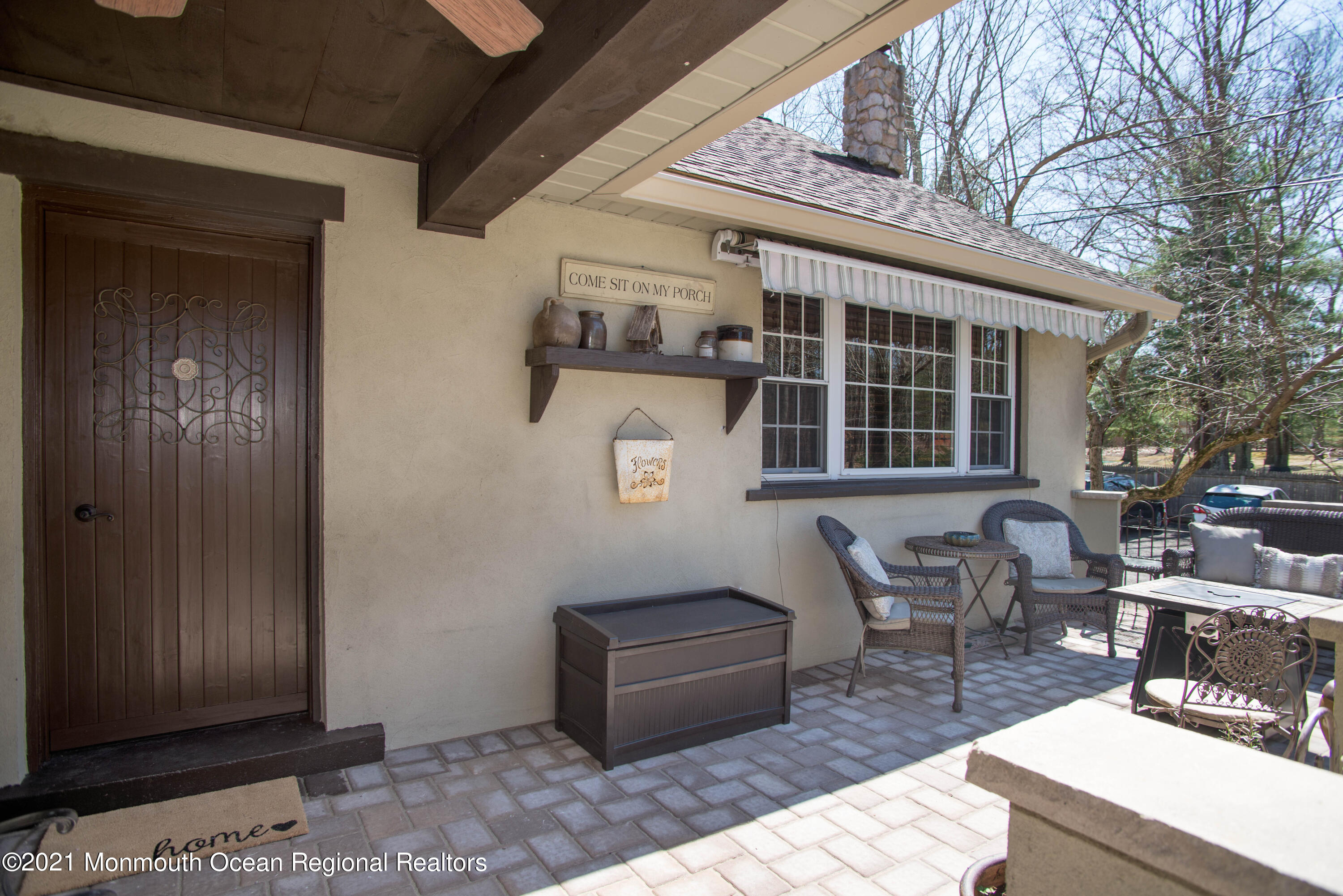 511 Cerrina Road Jackson, NJ 08527 - Photo 7 of 46 a view of a patio with table and chairs and potted plants
