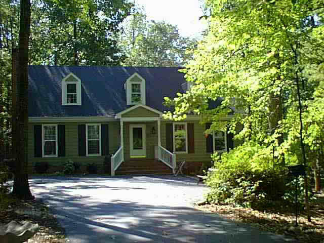 2272 Whippoorwill Road Charlottesville, VA 22901 - Photo 1 of 3 front view of a house with a street