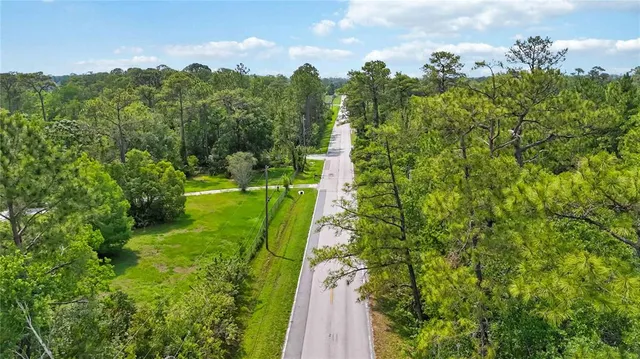 a view of a garden with a lake