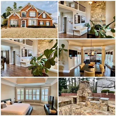 a front view of a residential apartment building with a yard