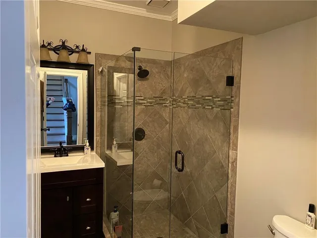 a bathroom with a sink and mirror
