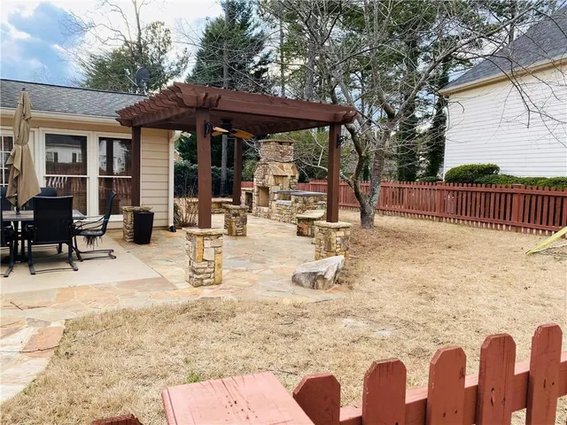 a view of pool with outdoor seating