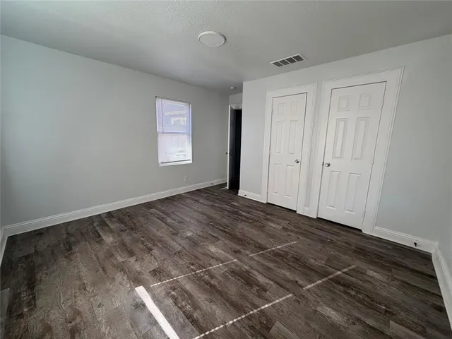 a view of an empty room and window